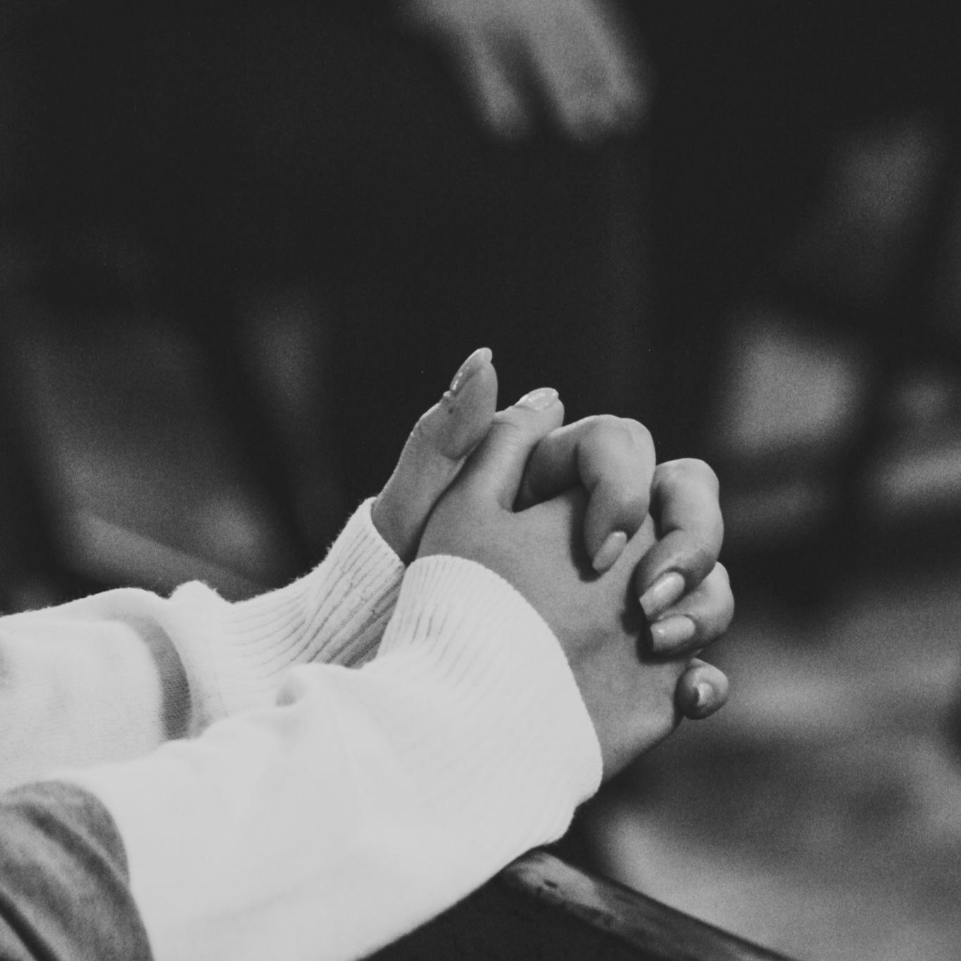 Hands folded in prayer